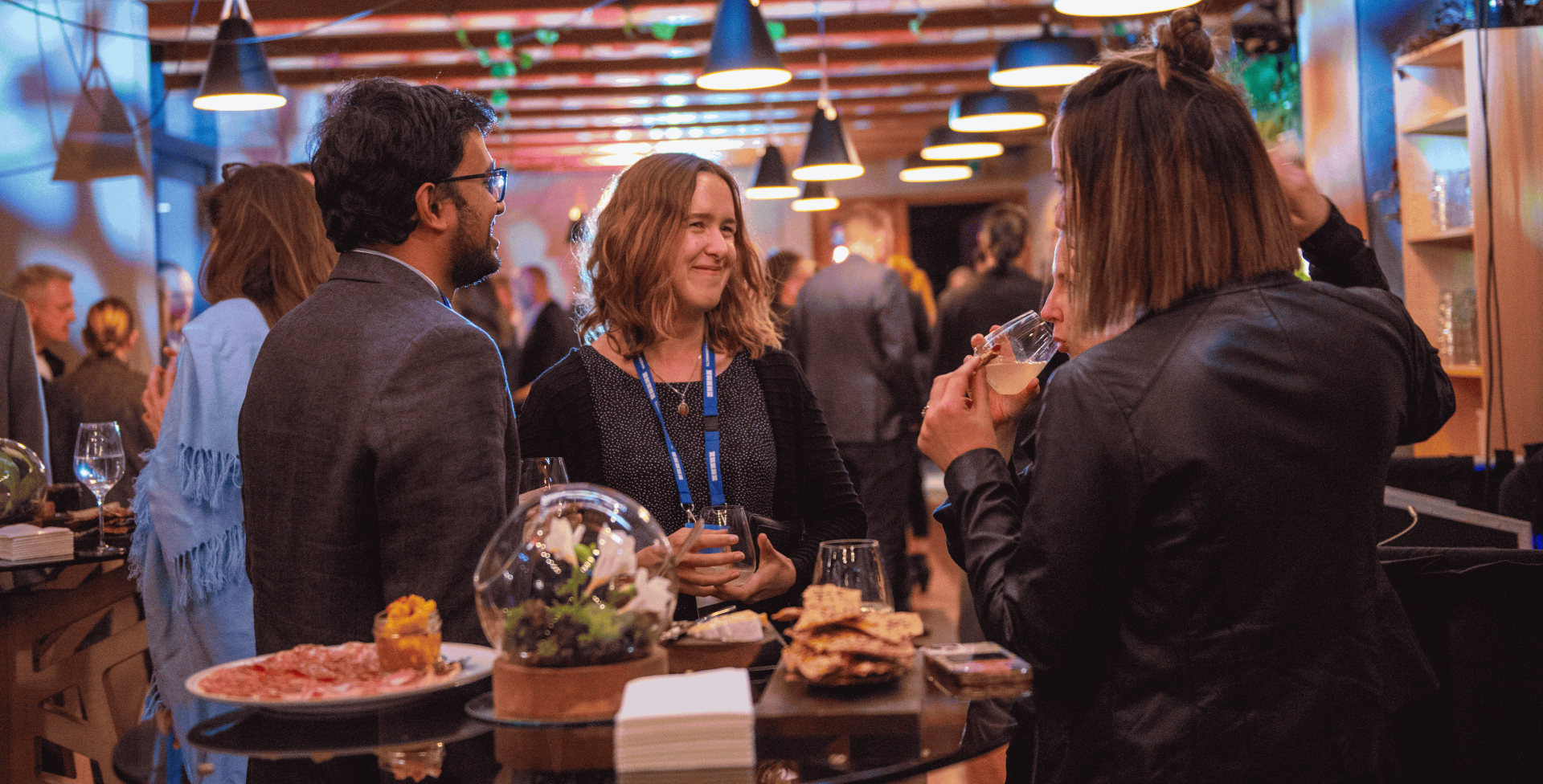 Buyers socialising over drinks and nibbles. TRENZ Connection